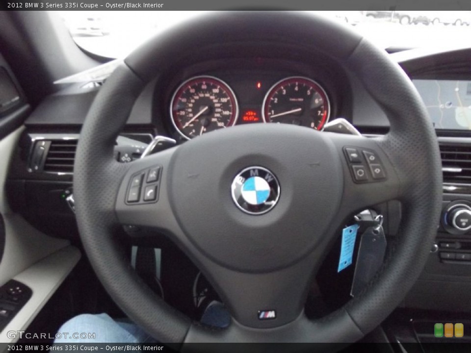 Oyster/Black Interior Steering Wheel for the 2012 BMW 3 Series 335i Coupe #61317839