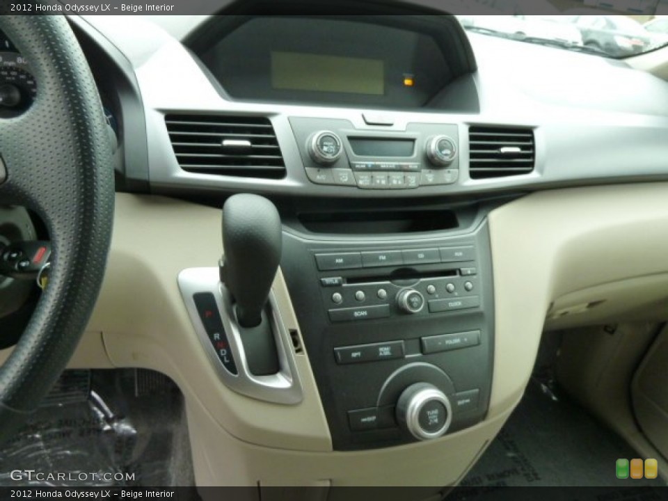 Beige Interior Controls for the 2012 Honda Odyssey LX #61332051