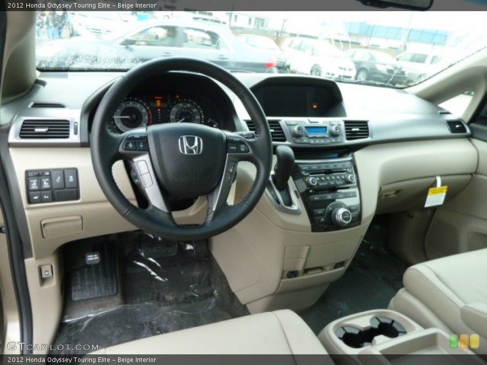 Beige Interior Dashboard for the 2012 Honda Odyssey Touring Elite #61332182