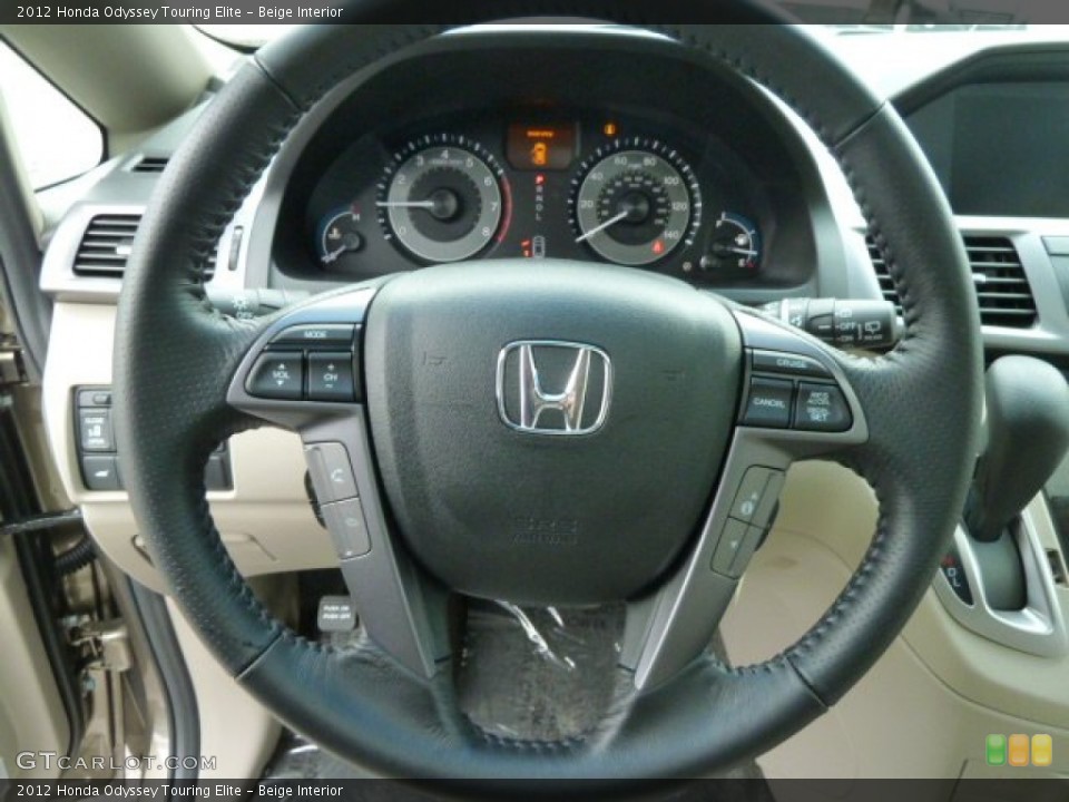 Beige Interior Steering Wheel for the 2012 Honda Odyssey Touring Elite #61332209