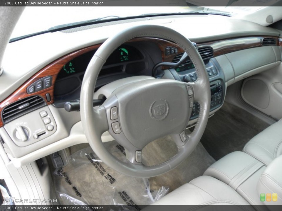 Neutral Shale Beige Interior Steering Wheel for the 2003 Cadillac DeVille Sedan #61412706