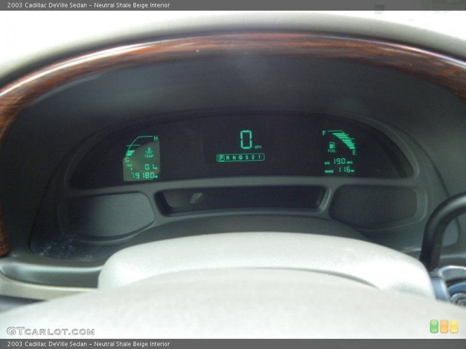 Neutral Shale Beige Interior Gauges for the 2003 Cadillac DeVille Sedan #61412882
