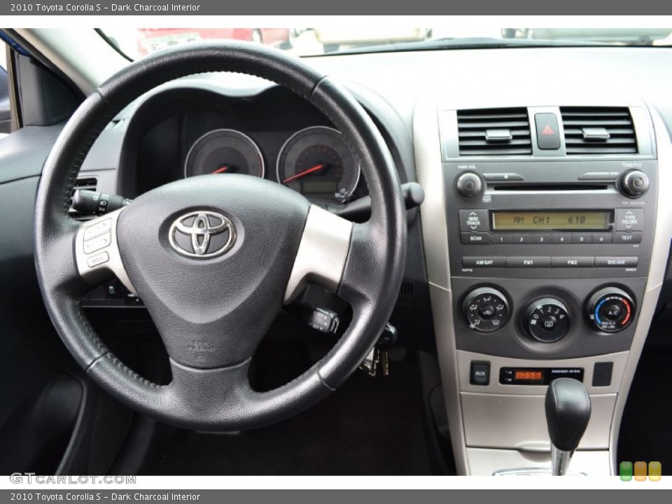 Dark Charcoal Interior Dashboard for the 2010 Toyota Corolla S #61418080