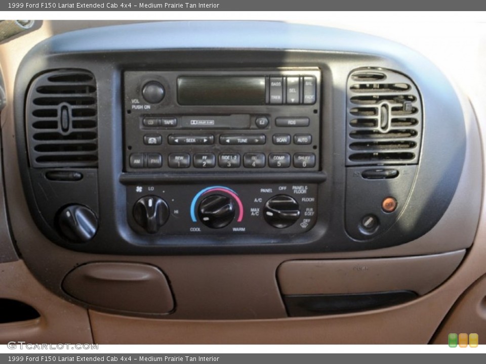 Medium Prairie Tan Interior Controls for the 1999 Ford F150 Lariat Extended Cab 4x4 #61433364