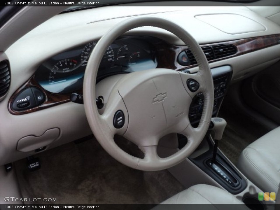 Neutral Beige Interior Steering Wheel for the 2003 Chevrolet Malibu LS Sedan #61450813