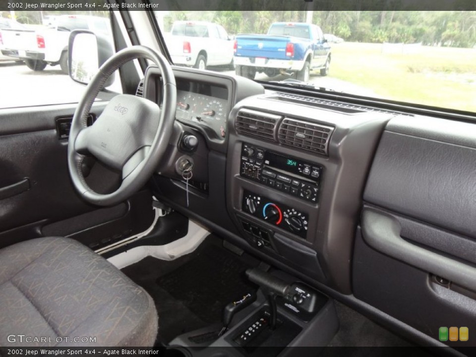 Agate Black Interior Dashboard for the 2002 Jeep Wrangler Sport 4x4 #61490865