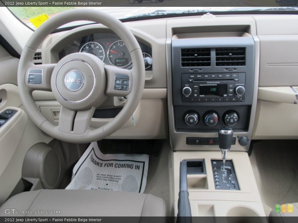 Pastel Pebble Beige Interior Dashboard for the 2012 Jeep Liberty Sport #61541756