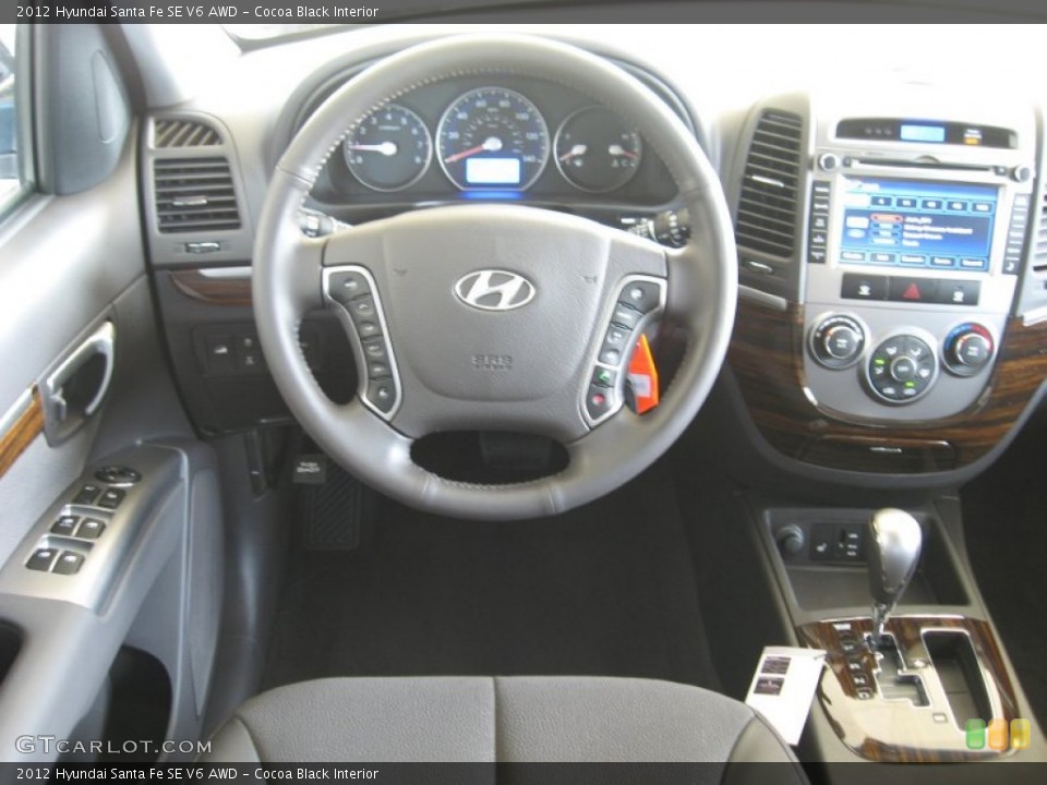 Cocoa Black Interior Dashboard for the 2012 Hyundai Santa Fe SE V6 AWD #61556675
