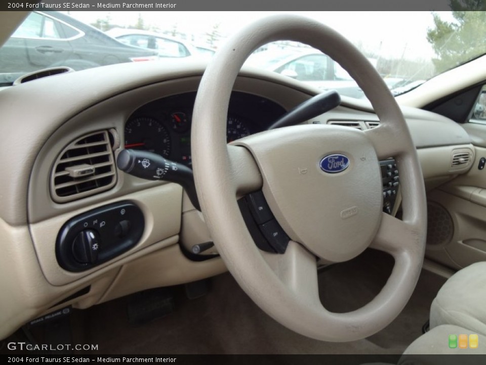 Medium Parchment Interior Steering Wheel for the 2004 Ford Taurus SE Sedan #61572894