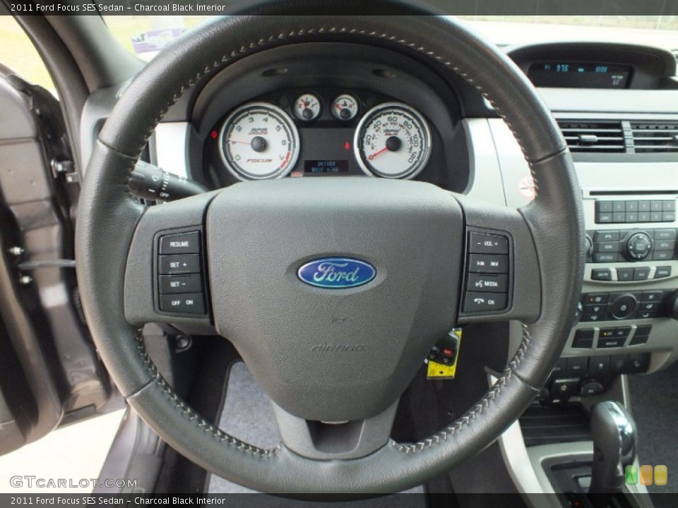 Charcoal Black Interior Steering Wheel for the 2011 Ford Focus SES Sedan #61586096