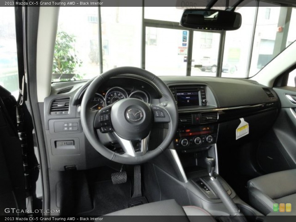 Black Interior Dashboard for the 2013 Mazda CX-5 Grand Touring AWD #61606673