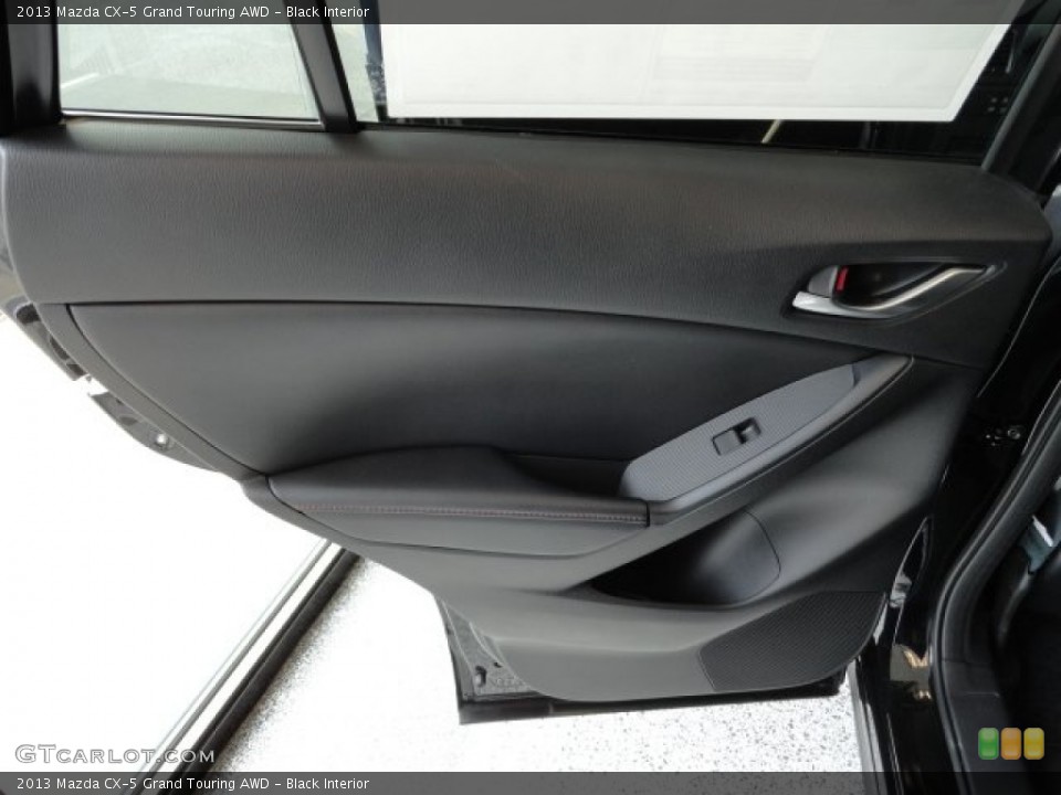 Black Interior Door Panel for the 2013 Mazda CX-5 Grand Touring AWD #61606680