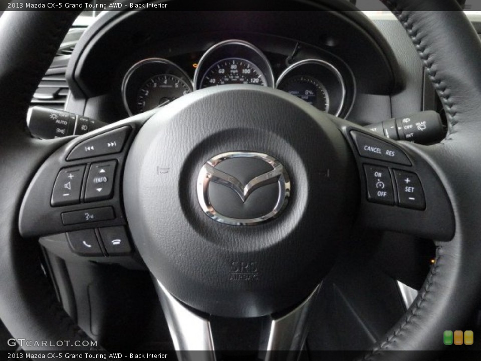 Black Interior Steering Wheel for the 2013 Mazda CX-5 Grand Touring AWD #61606743