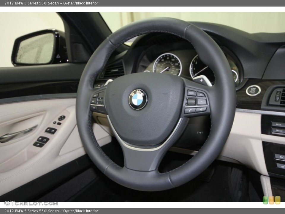 Oyster/Black Interior Steering Wheel for the 2012 BMW 5 Series 550i Sedan #61616142