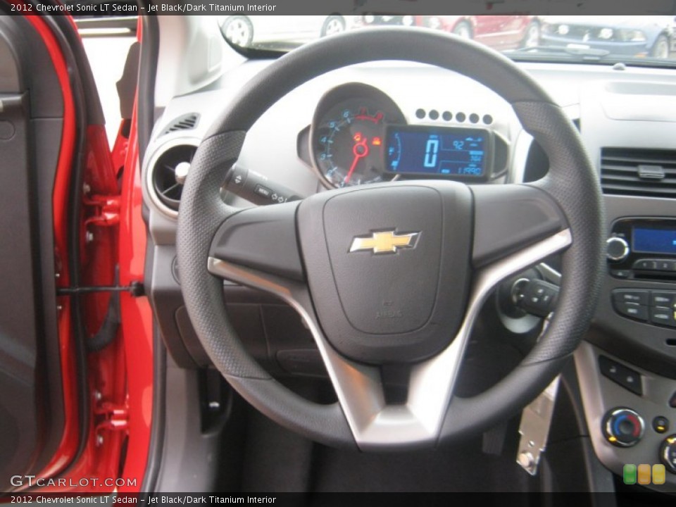Jet Black/Dark Titanium Interior Steering Wheel for the 2012 Chevrolet Sonic LT Sedan #61618897