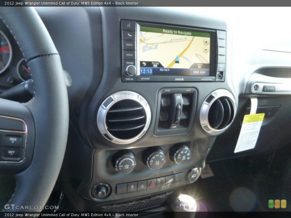 Black Interior Controls for the 2012 Jeep Wrangler Unlimited Call of Duty: MW3 Edition 4x4 #61620627