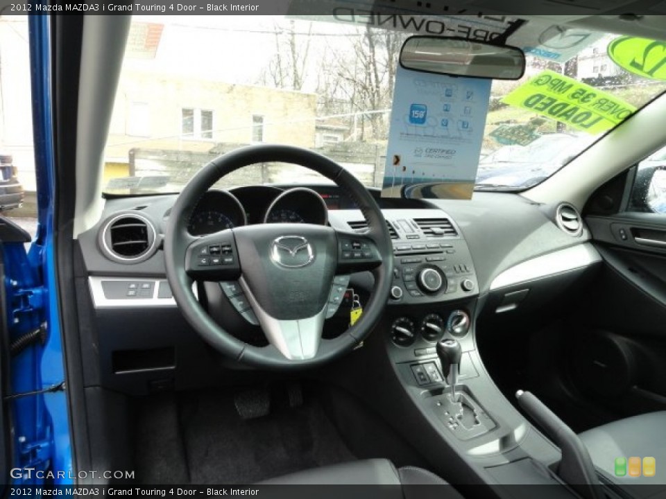 Black Interior Dashboard for the 2012 Mazda MAZDA3 i Grand Touring 4 Door #61661920