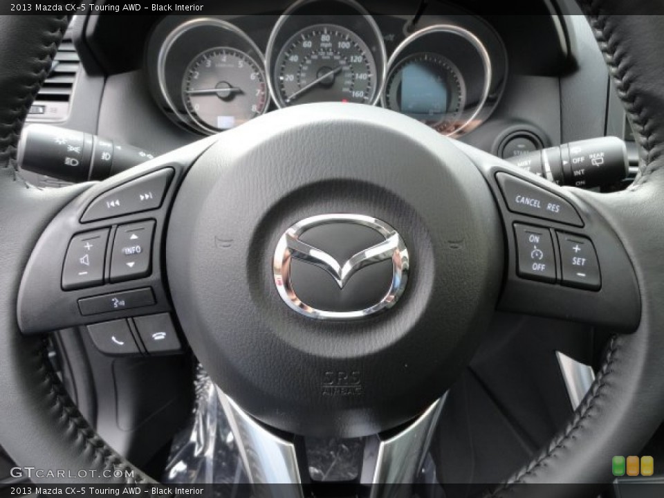 Black Interior Steering Wheel for the 2013 Mazda CX-5 Touring AWD #61662280