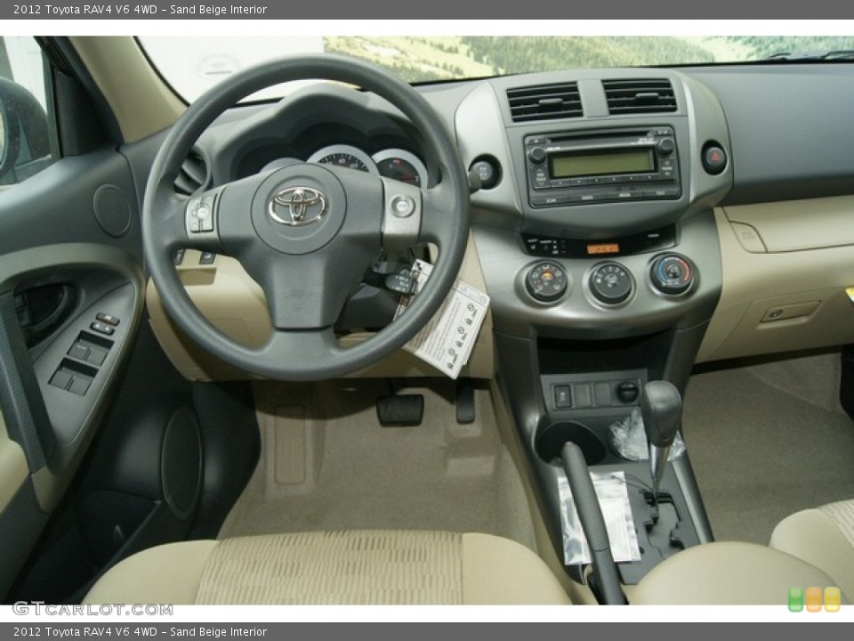 Sand Beige Interior Dashboard for the 2012 Toyota RAV4 V6 4WD #61684833