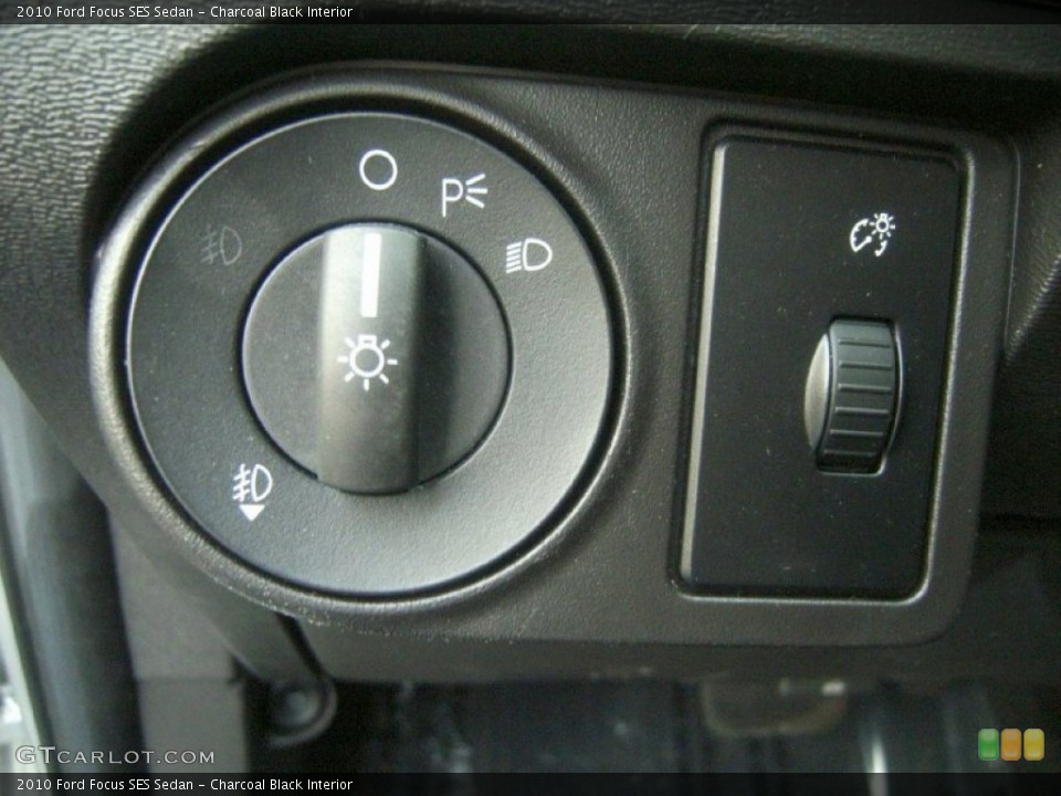 Charcoal Black Interior Controls for the 2010 Ford Focus SES Sedan #61713402