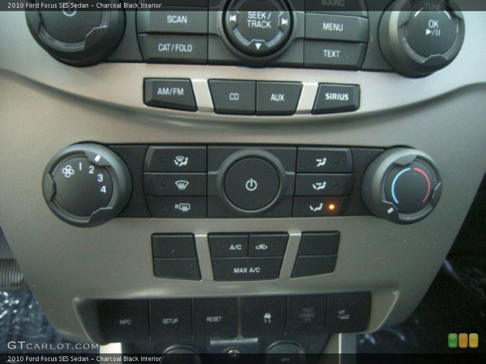 Charcoal Black Interior Controls for the 2010 Ford Focus SES Sedan #61713431