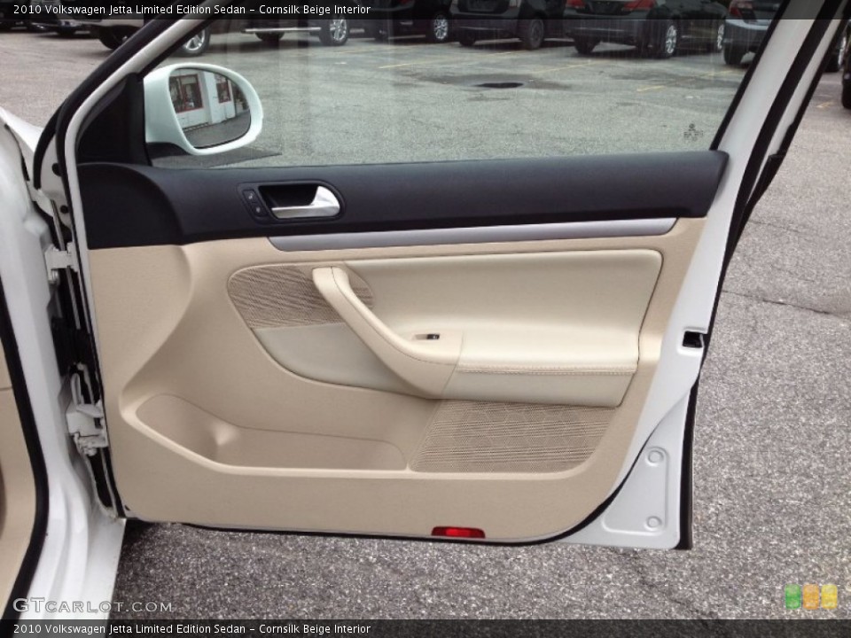 Cornsilk Beige Interior Door Panel for the 2010 Volkswagen Jetta Limited Edition Sedan #61805312