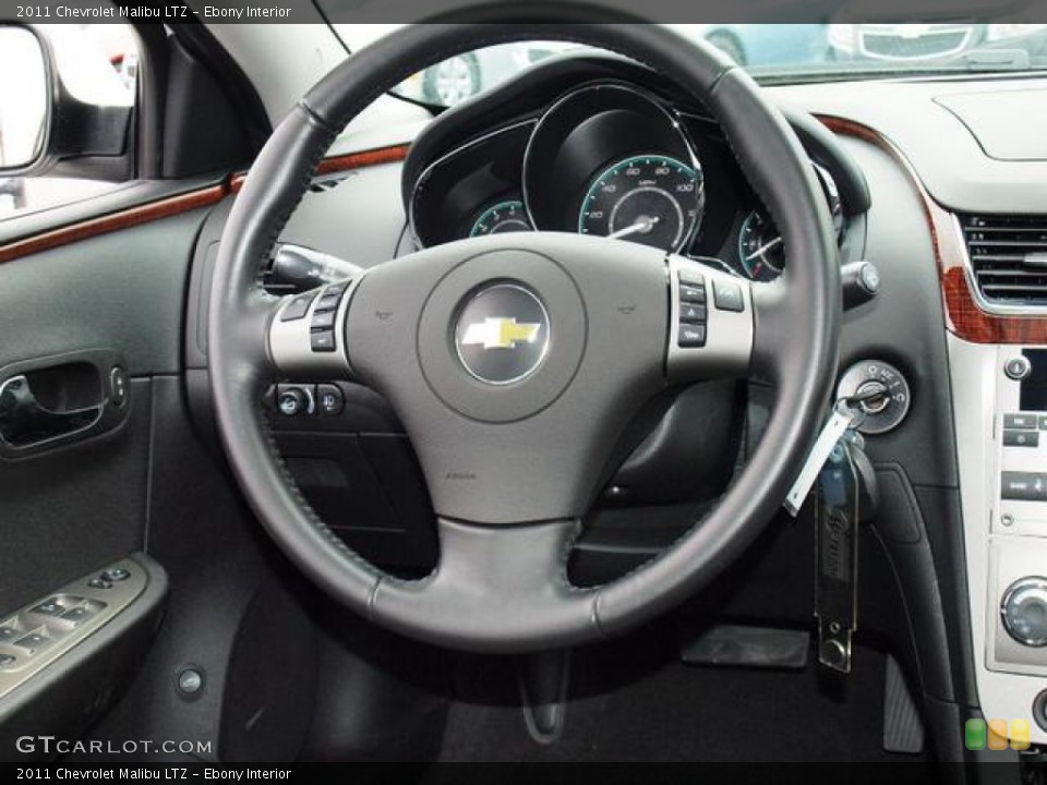 Ebony Interior Steering Wheel for the 2011 Chevrolet Malibu LTZ #61840701