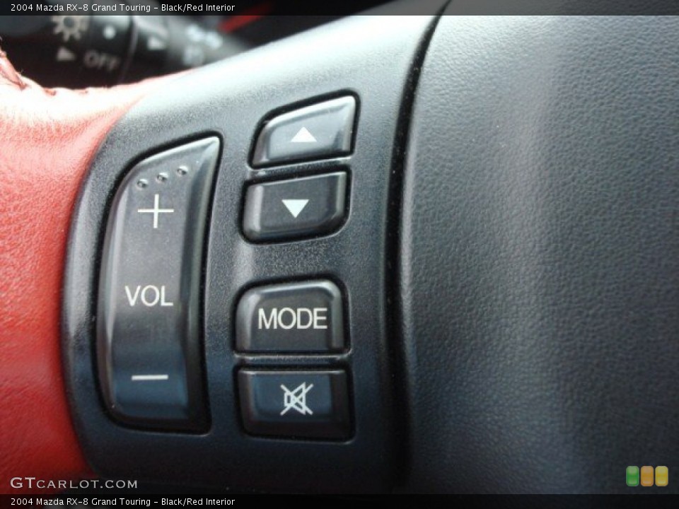 Black/Red Interior Controls for the 2004 Mazda RX-8 Grand Touring #61843251