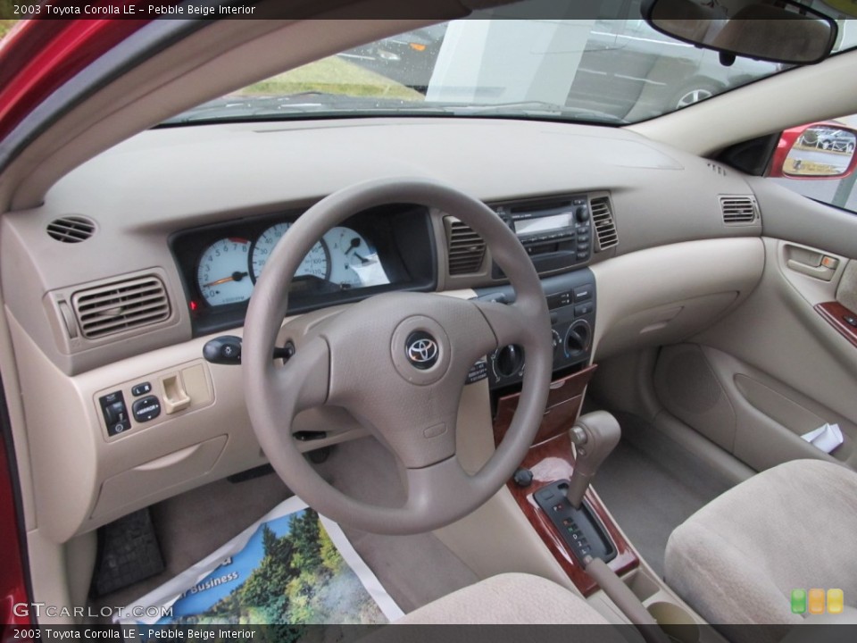 Pebble Beige Interior Dashboard for the 2003 Toyota Corolla LE #61851072