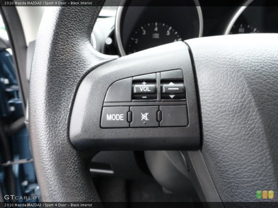 Black Interior Controls for the 2010 Mazda MAZDA3 i Sport 4 Door #61855806