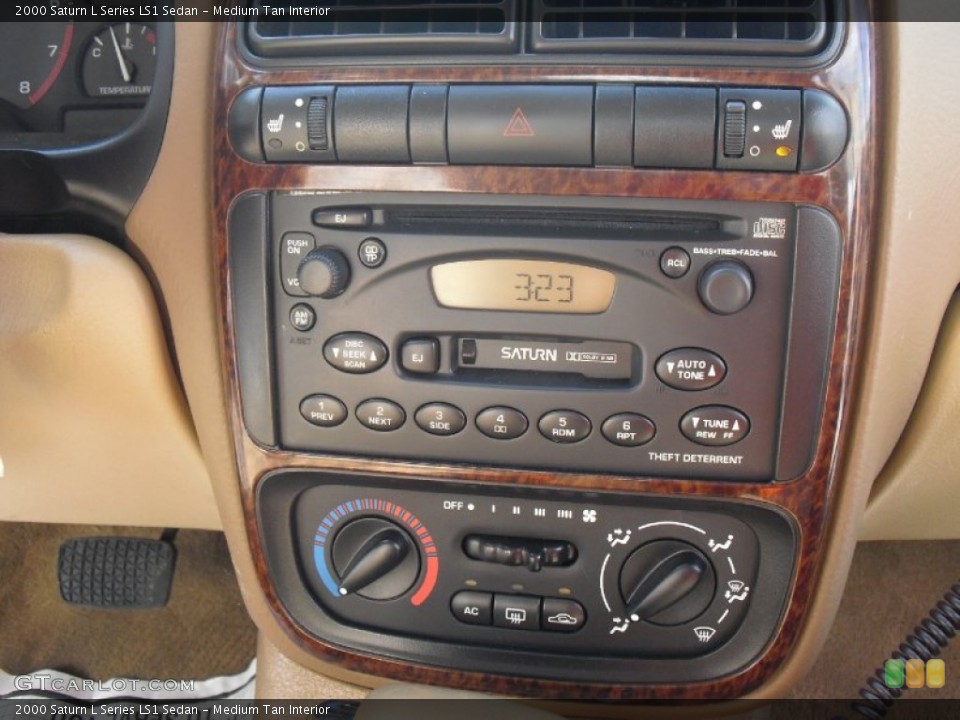 Medium Tan Interior Controls for the 2000 Saturn L Series LS1 Sedan #61859169
