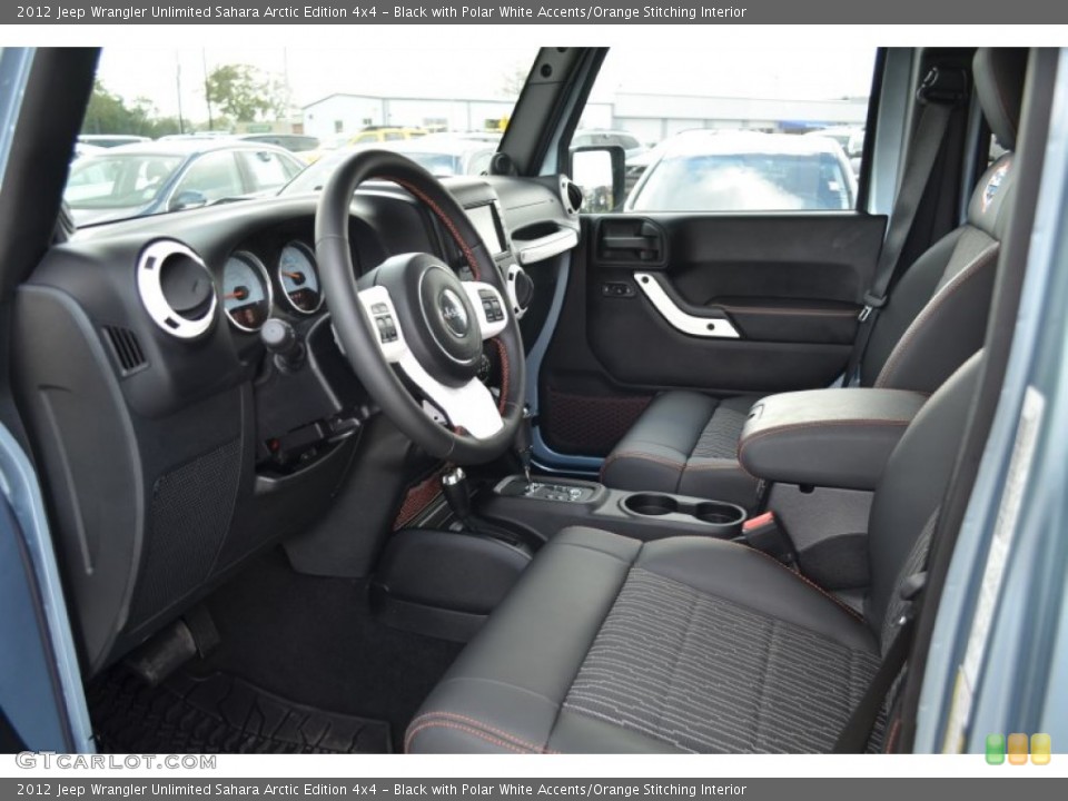 Black with Polar White Accents/Orange Stitching Interior Photo for the 2012 Jeep Wrangler Unlimited Sahara Arctic Edition 4x4 #61874960