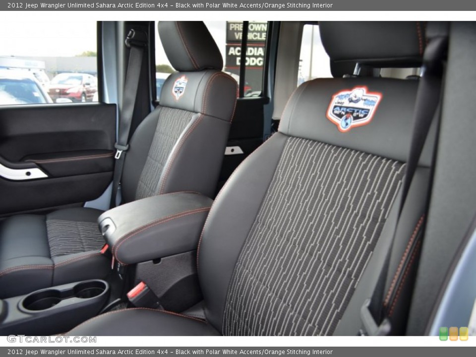 Black with Polar White Accents/Orange Stitching Interior Photo for the 2012 Jeep Wrangler Unlimited Sahara Arctic Edition 4x4 #61874983