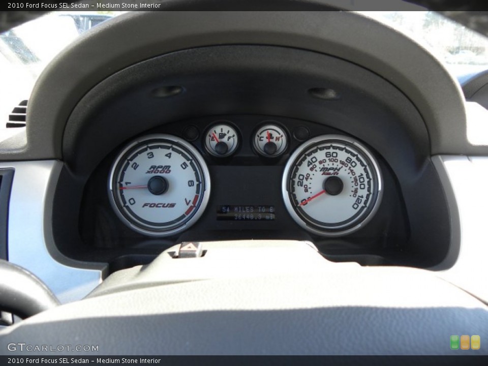 Medium Stone Interior Gauges for the 2010 Ford Focus SEL Sedan #61892706