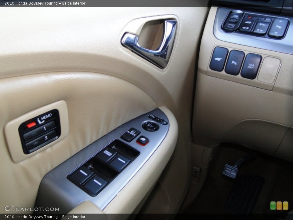 Beige Interior Controls for the 2010 Honda Odyssey Touring #61953542