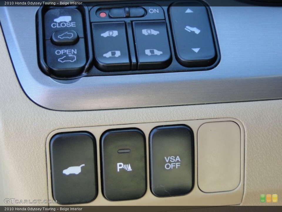 Beige Interior Controls for the 2010 Honda Odyssey Touring #61953551