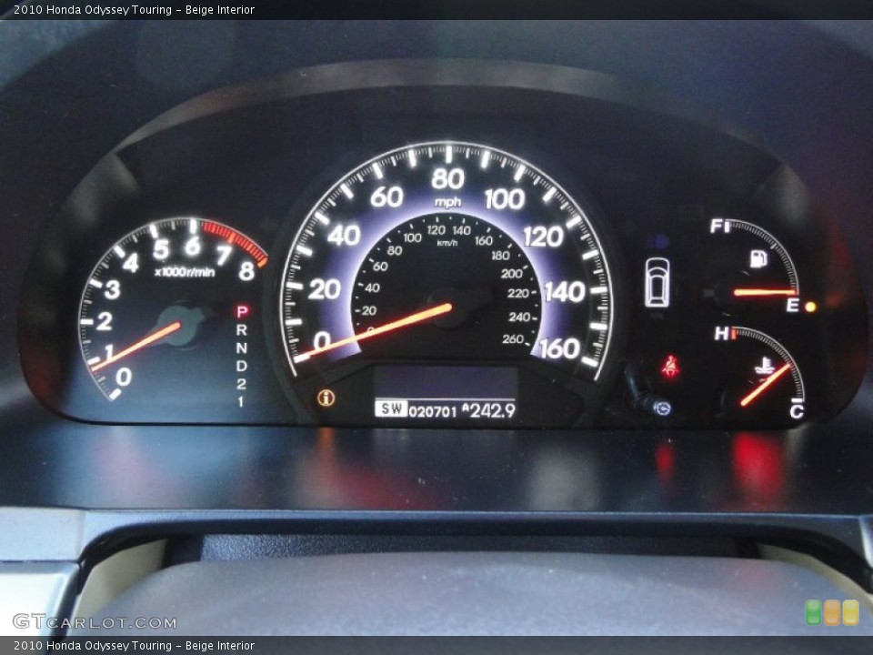 Beige Interior Gauges for the 2010 Honda Odyssey Touring #61953566