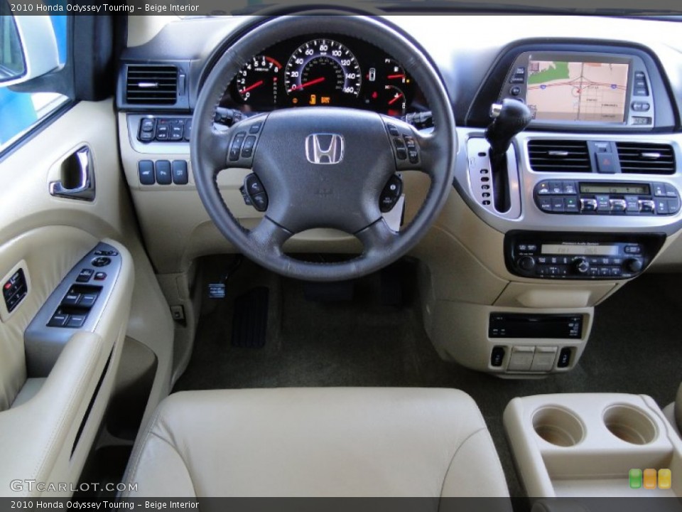Beige Interior Dashboard for the 2010 Honda Odyssey Touring #61953581