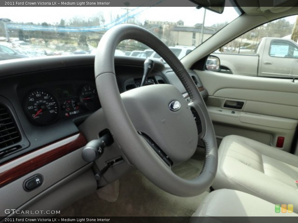 Medium Light Stone Interior Steering Wheel for the 2011 Ford Crown Victoria LX #61978442