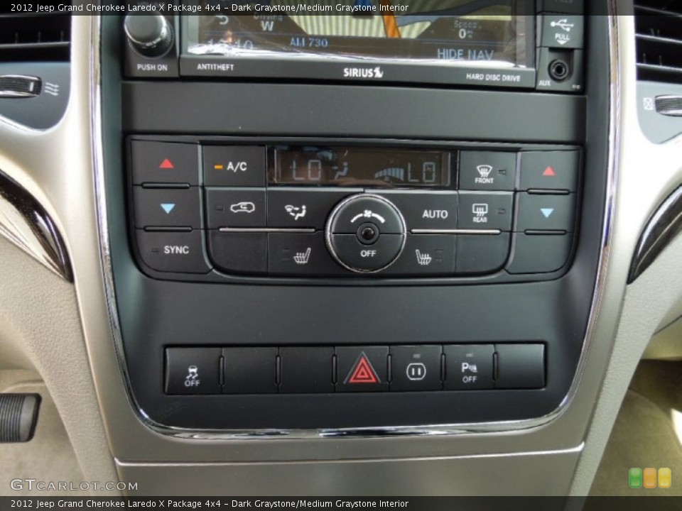 Dark Graystone/Medium Graystone Interior Controls for the 2012 Jeep Grand Cherokee Laredo X Package 4x4 #62017296