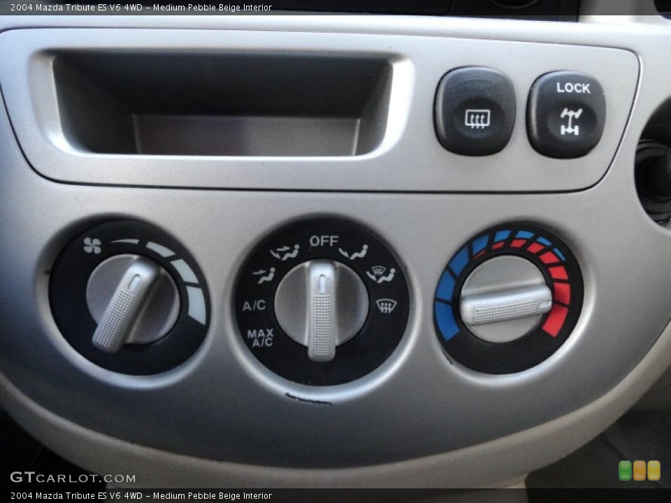 Medium Pebble Beige Interior Controls for the 2004 Mazda Tribute ES V6 4WD #62028066