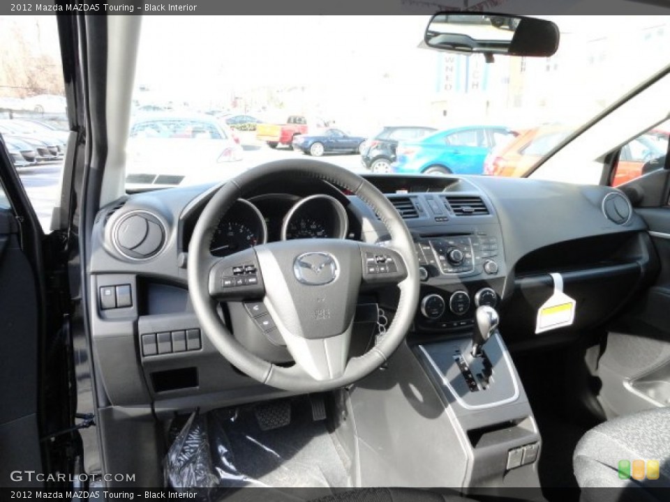 Black Interior Dashboard for the 2012 Mazda MAZDA5 Touring #62044477