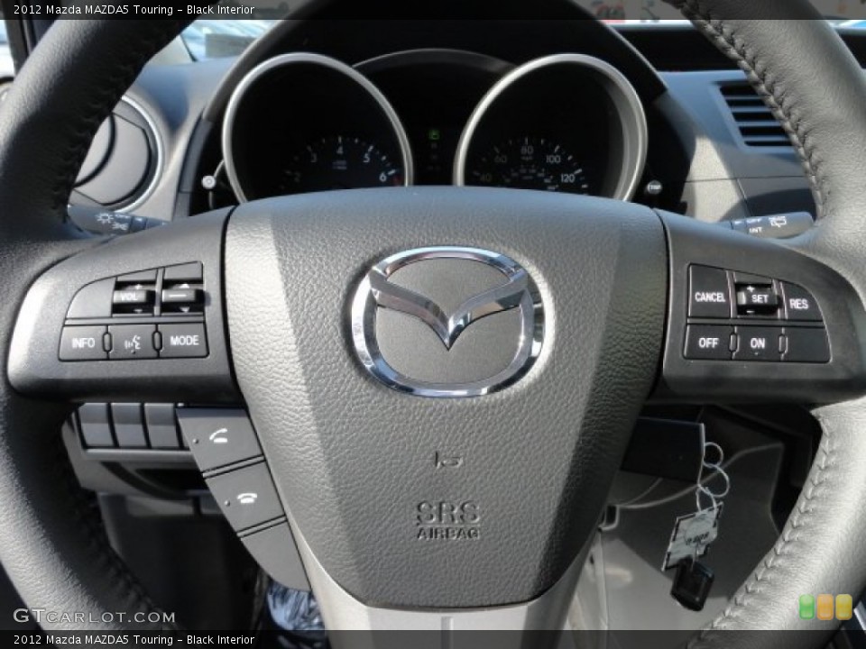 Black Interior Steering Wheel for the 2012 Mazda MAZDA5 Touring #62044515