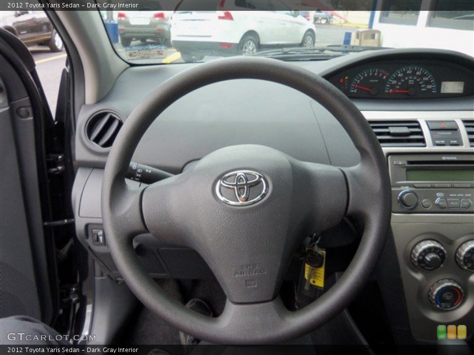 Dark Gray Interior Steering Wheel for the 2012 Toyota Yaris Sedan #62048817