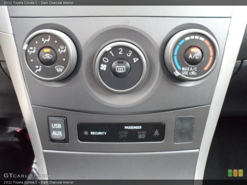 Dark Charcoal Interior Controls for the 2012 Toyota Corolla S #62070577