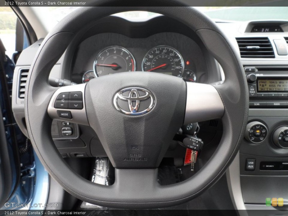 Dark Charcoal Interior Steering Wheel for the 2012 Toyota Corolla S #62070595
