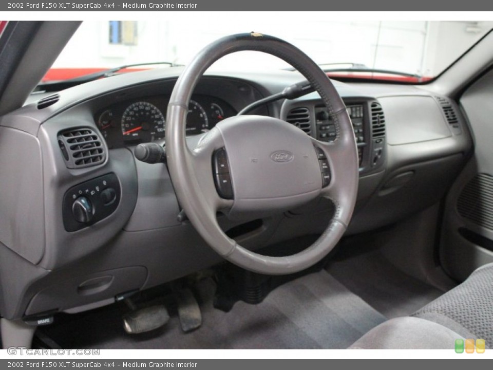Medium Graphite Interior Dashboard for the 2002 Ford F150 XLT SuperCab 4x4 #62099597