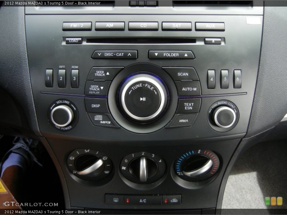Black Interior Controls for the 2012 Mazda MAZDA3 s Touring 5 Door #62121055