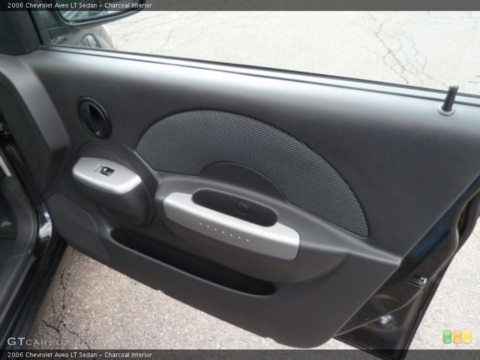 Charcoal Interior Door Panel for the 2006 Chevrolet Aveo LT Sedan #62122868