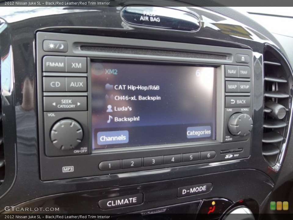 Black/Red Leather/Red Trim Interior Controls for the 2012 Nissan Juke SL #62309678